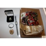 A box of various costume jewellery