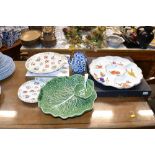 A leaf plate together with a two tier cake stand,