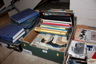 A box of art related books