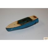 A Hornby Racer One clockwork tin plate boat, lacki