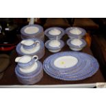 A quantity of Palissy chequers pattern dinnerware