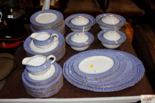 A quantity of Palissy chequers pattern dinnerware