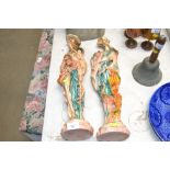 A pair of resin Oriental figures