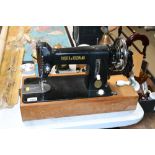 A Frister & Rossmann hand sewing machine