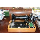 A Singer hand sewing machine