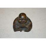 A reproduction brass Buddha (64)