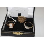 A 9ct gold ring AF, 1.5g, a 9ct gold ring set three white stones, 1.5g and another 9ct gold cameo ri