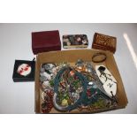 A box containing various costume jewellery, trinke