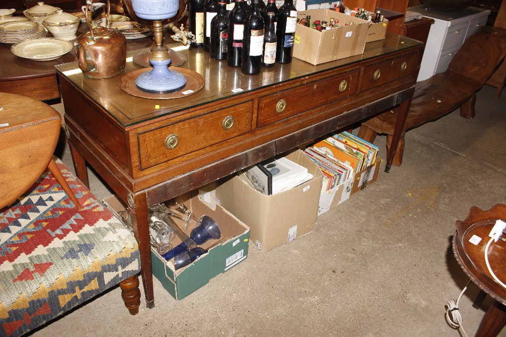 A 19th Century mahogany and walnut sideboard fitte