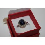 A TGGC sterling silver and diamond and sapphire ri