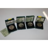 Four Isle of Man Crowns, uncirculated