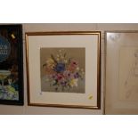 A gilt framed needlework still life study of flowe