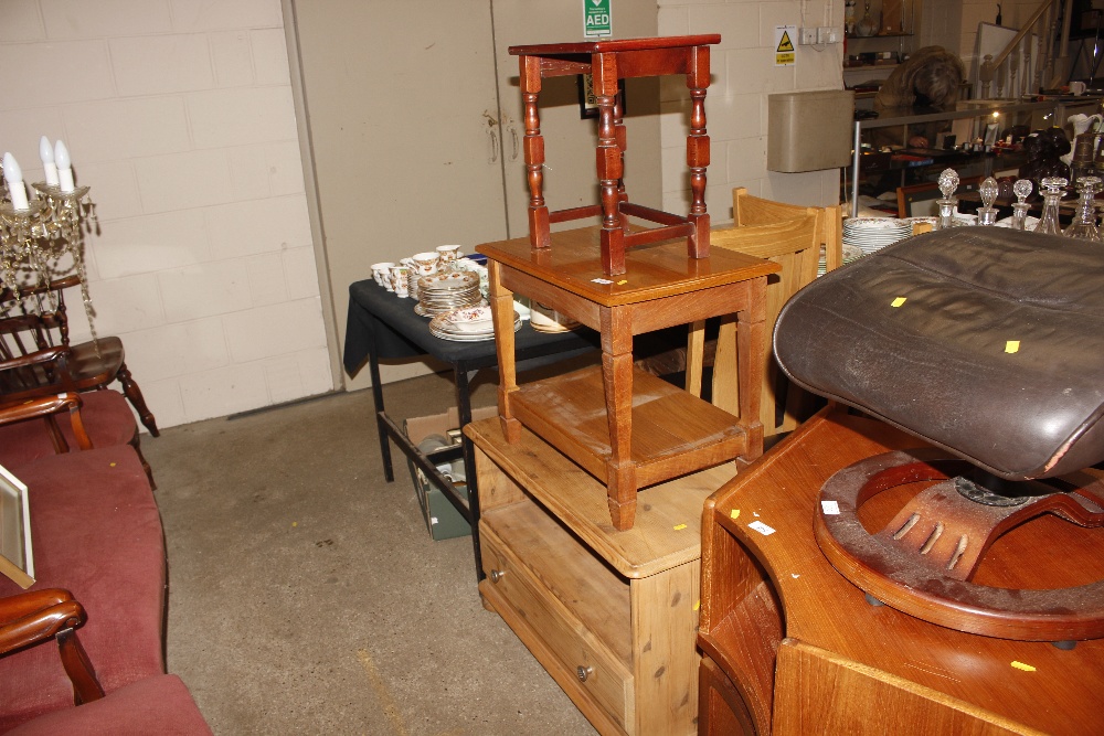 A stripped pine low unit and two occasional tables