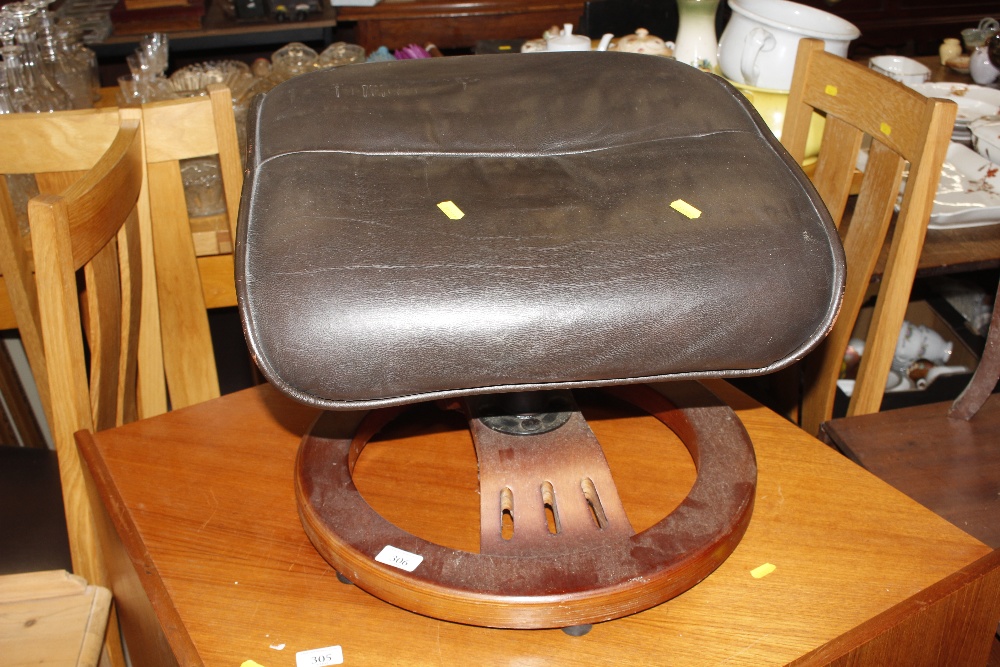 A retro style faux leather foot stool