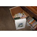 A box of miscellaneous prints; books etc
