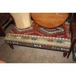 A large stool with Kilim upholstery