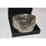 A wide Lily & Co 1964 silver snap bangle, 61.2g