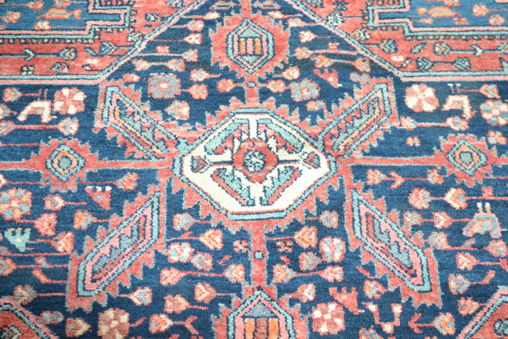 An approx. 7'1" x 4'3" Persian red and blue patter - Image 3 of 4