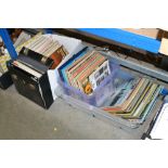 Three boxes and a case of records