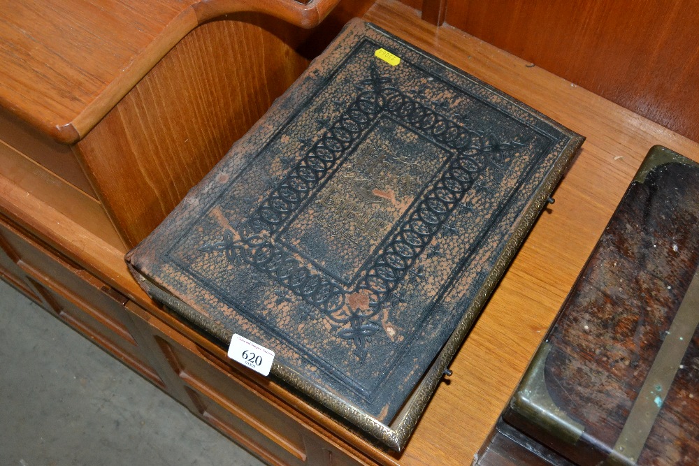 A brass and leather bound Holy Bible