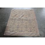 An approx. 4'10" x 4' pattern rug