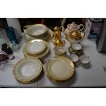 A collection of gilt decorated teaware; lustre tea