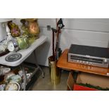 A brass stick stand and contents, three walking st