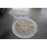 An approx. circular 3'10" floral pattern rug toget