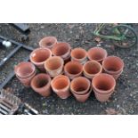 A quantity of terracotta plant pots