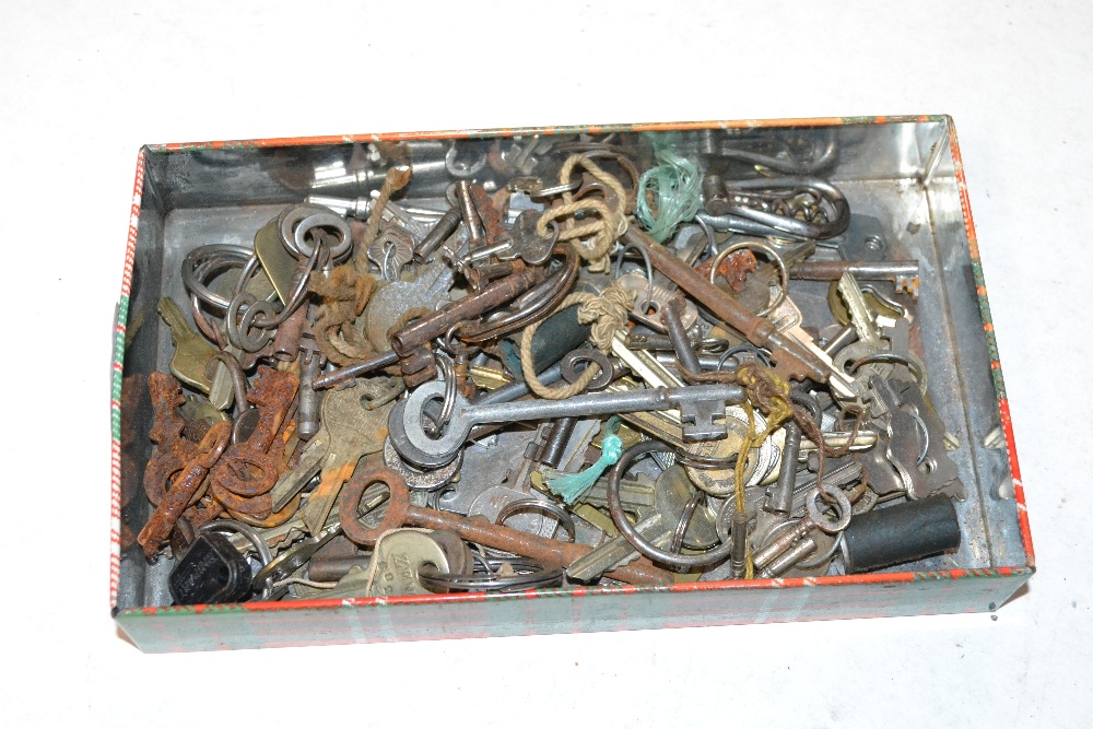 A tin of various keys