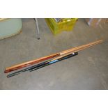 Three two piece snooker cues and a telescopic cue