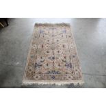 An approx. 5'7" x 3'3" Green pattern rug