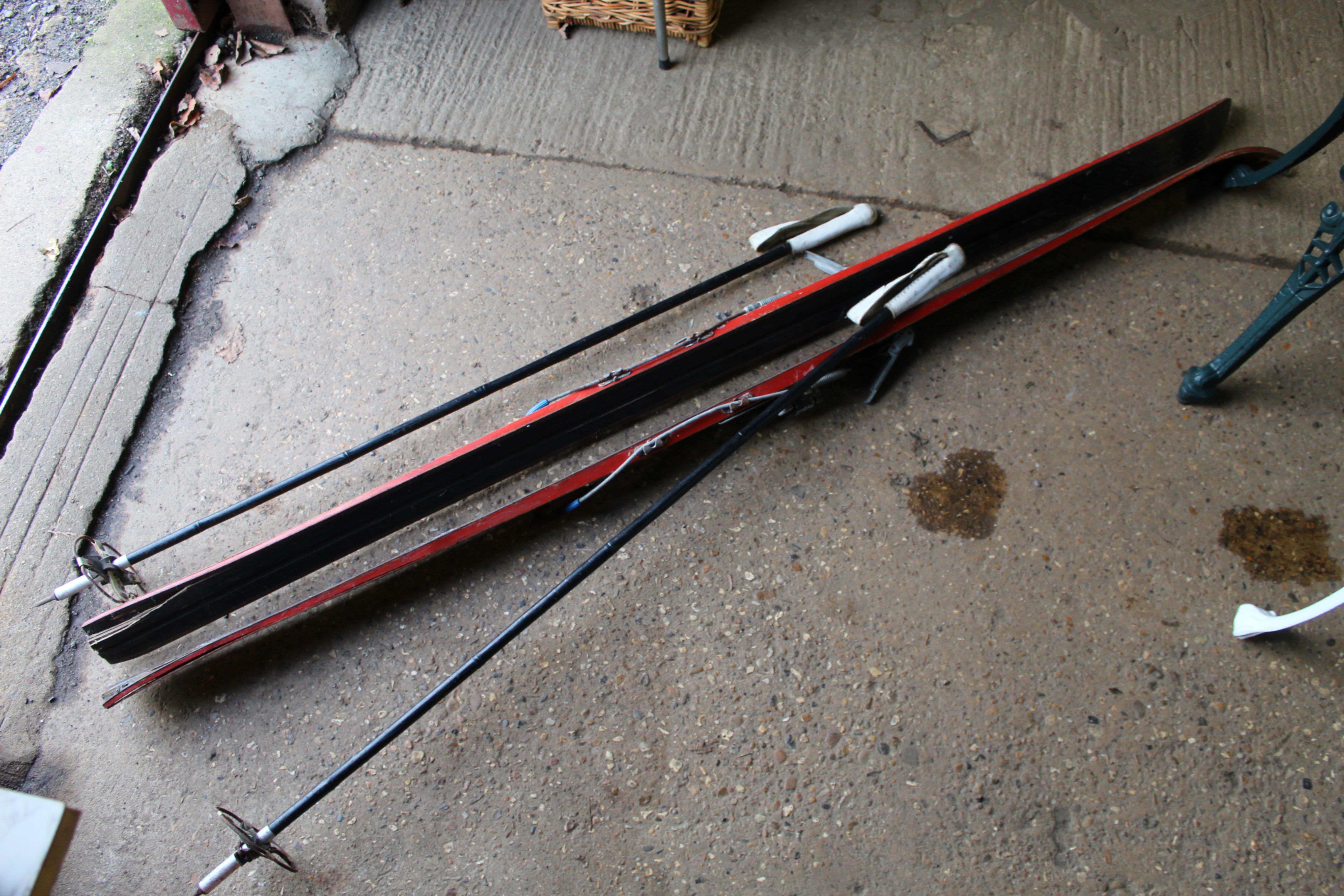 A pair of vintage Schafer Kampf wooden skis and a