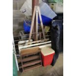 A wooden easel; plastic bin; tent frame etc