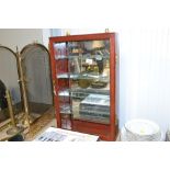 A wall mounting display case with key