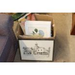 A box of various miscellaneous prints and books