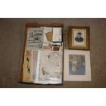 A box of various photos and ephemera