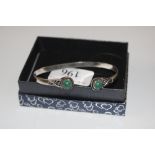 A 925 marked silver and malachite bangle