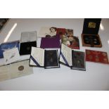 A boxed Canadian coin set and a Queen Elizabeth II