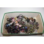 A box of various costume jewellery