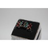 A red, green and blue stone dress ring