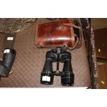 A WW2 pair of British binoculars with leather case