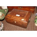 A 19th Century walnut workbox with lion mask handl