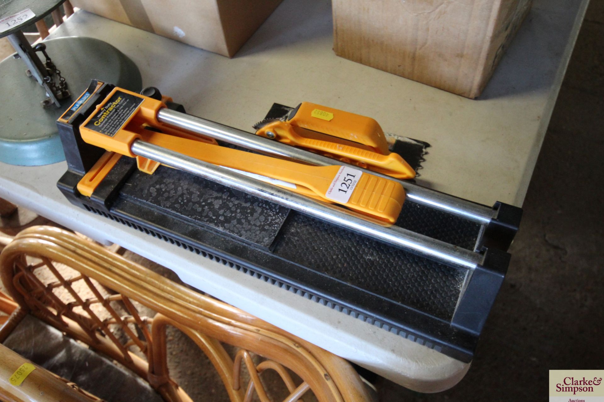 A heavy duty tile cutter and tools