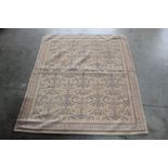 An aprox 4'10" x 4' patterned rug