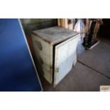 A metal garage vented cabinet