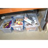 Three boxes containing various Lego; action figure