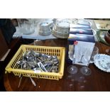 A quantity of wine glasses and stainless steel cut