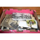 A box of miscellaneous vintage photographs