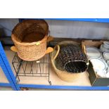 A wicker crib; a cot together with a vase